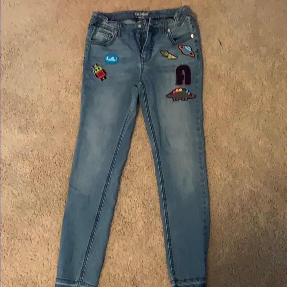 Mildly worn patch Jeans